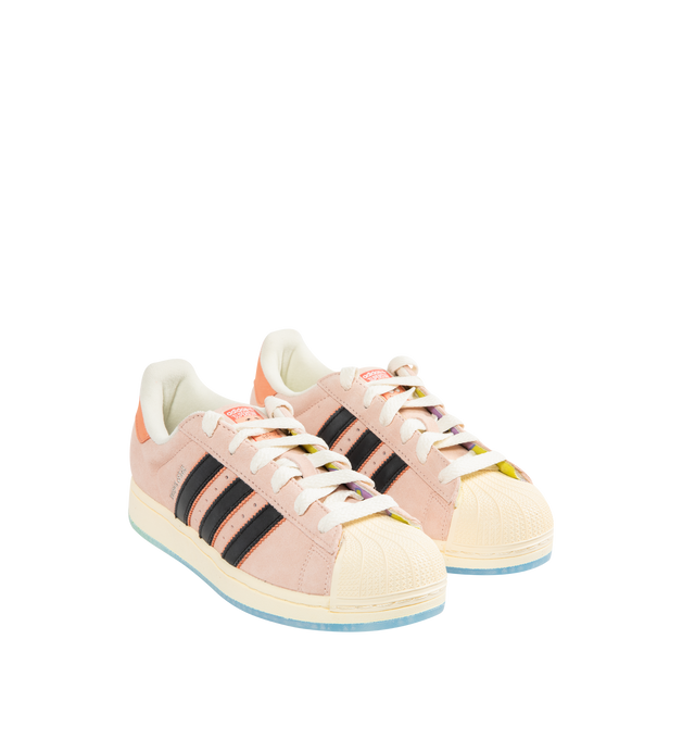 Image 2 of 5 - PINK - ADIDAS SpongeBob's Patrick Superstar Sneaker featuring 3-stripes, custom Patrick graphic on the tongue, translucent outsole reveals underwater scenes from under the sea, suede upper, lace up closure, branded details, rubber shell toe and rubber sole. 