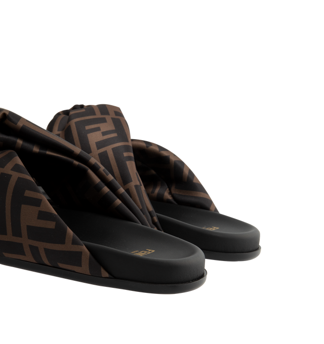 Image 3 of 4 - BROWN - FENDI Feel Satin Slides featuring padded double-band flat slides with decorative D-ring buckle with three-dimensional Fendi lettering. Made of satin with the iconic FF motif in shades of brown. Black leather insole and edges. Gold-finish metalware.Made in Italy. 