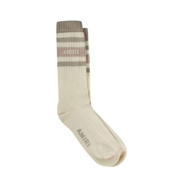 Image 1 of 2 - NEUTRAL - AMIRI Stack Stripe Chunky Knit Crew Socks featuring the Amiri Stack motif with stripe detailing, ribbed cuff to prevent slipping and reinforced toe and heel.38% wool, 10% cashmere, 28% viscose, 22% polyamide, 2% elastane. Made in Italy. 