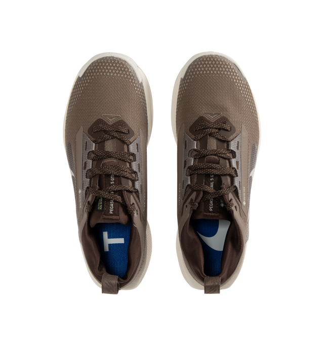 Image 5 of 5 - BROWN - NIKE Pegasus Trail 5 GORE-TEX SP Sneaker featuring wet-weather protection, waterproof GORE-TEX upper, an all-terrain outsole, reflective design details and a ReactX foam midsole. 