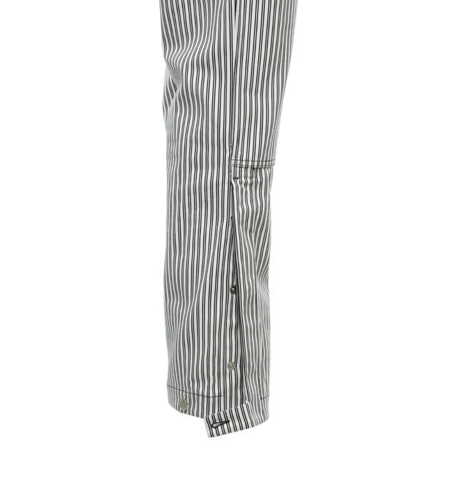 Image 3 of 4 - MULTI - AMIRI Striped Carpenter Pants featuring regular rise, five-pocket style, reinforced front legs, painter loop at side, utility pockets on legs, full length, relaxed fit through straight legs and button zip closure. 100% cotton. Made in Italy. 