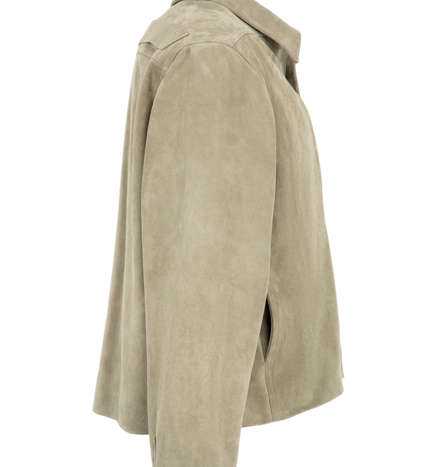 Image 3 of 3 - NEUTRAL - Rick Owens Men's Alice Jacket is crafted from a suede leather and features a natural tumbled grain finish. Cut to an above-hip length with long sleeves, this fully lined jacket is detailed with a classic collar, concealed snap-front closures, level shoulder seams, and snap cuffs. Functional elements include two vertical front jet pockets, side-seam pockets, and internal zippered pockets. Main Material: Suede leather. Front and Pocket Lining: 100% Cotton. Back and Sleeve Lining: 100% 