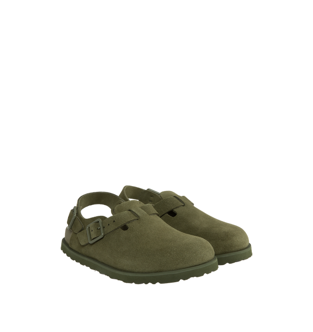 Image 2 of 4 - GREEN - Birkenstock's Tokio a closed-toe clog in a narrow width. The iconic Tokio sillhouette closely follows the contours of the foot featuring adjustable heel and arch straps. Upper: Luxurious fine flesh out suede, a full grain leather that has been flipped to use the fuzzy side. Footbed: Anatomical shaped BIRKENSTOCK cork-latex footbed, covered with premium, color-matching smooth nappa leather. Sole: EVA outsole with a 3mm EVA welt updates the standard die-cut outsole while still ensuring  