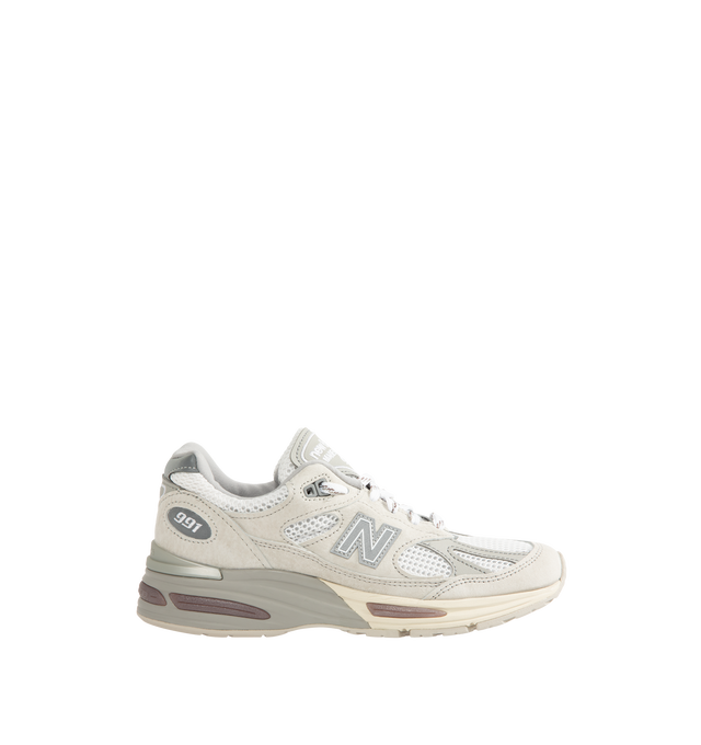 Image 1 of 5 - GREY - New Balance Unisex Made in UK 991v2 Sneakers is crafted in pigskin suede, mesh, and synthetic materials. Full-length FuelCell cushioning is paired with semi-translucent ABZORB SBS pods and an ENCAP midsole, while reflective details, a debossed "N" logo, and embroidered tongue branding complete the design. Upper: Pigskin Suede, Mesh, and Synthetic Materials. Made in UK. *Unisex style in men's sizing. 