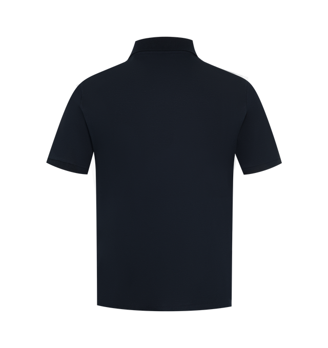 Image 2 of 2 - BLUE - Saint Laurent Men's Piqu Cotton Polo Shirt with Cassandre Embroidery is crafted from recycled cotton piqu and features a classic short-sleeve silhouette with a ribbed polo collar. Designed with a three-button placket and signature Cassandre embroidery at the front, this designer polo offers a refined take on an everyday menswear staple. Main Material: 100% Recycled Cotton. Collar: Ribbed Polo Collar. Closure: Three-Button Placket. Details: Cassandre Embroidery. Made in Italy. 