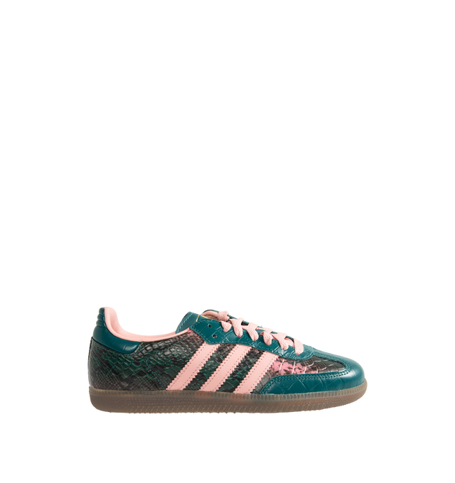 Image 1 of 5 - GREEN - Adidas Women's Samba OG Shoes reinterpret the brands iconic soccer-inspired silhouette with premium leather construction and heritage detailing. Designed with a lace-up closure and the signature elongated tongue, this updated version pairs classic Samba styling with modern versatility. Metallic Samba branding and Trefoil detailing celebrate the legacy of adidas Originals, while the durable rubber outsole provides reliable traction for everyday wear. Main Material: Leather. Closure: La 