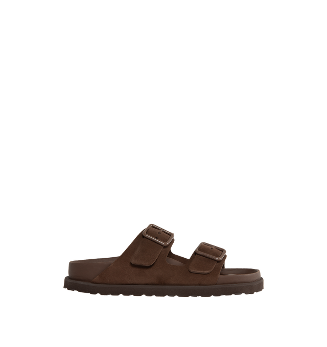 BROWN - Birkenstock's Arizona sandals in a narrow width. The iconic Arizona sillhouette is  updated in suede featuring adjustable straps with buckle closures, logo details, shaped insole, and EVA outsole. Upper: Luxurious fine flesh out suede, a full grain leather that has been flipped to use the fuzzy side. Footbed: Anatomical shaped BIRKENSTOCK cork-latex footbed, covered with premium, color-matching smooth nappa leather. Sole: EVA outsole with a 3mm EVA welt updates the standard die-cut outsole while sti