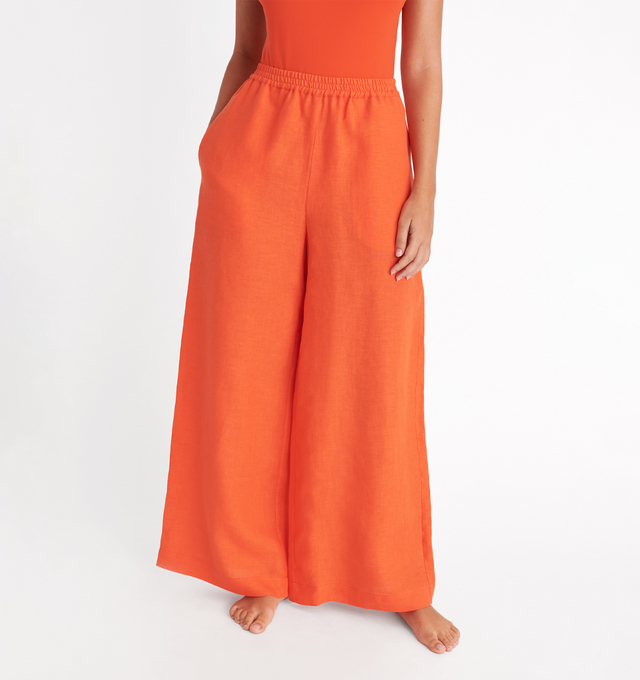 Image 5 of 5 - ORANGE - ERES Select Wide Pants featuring two patch pockets at the front and back, wide hems at the bottom and elastic at the waist. 100% Linen. Made in Bulgaria. 