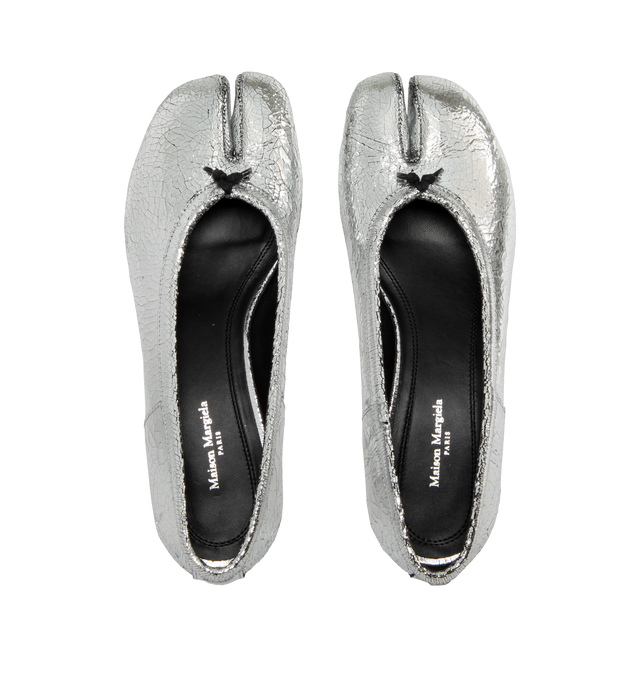 Image 4 of 4 - SILVER - Maison Margiela Tabi new ballerinas in a broken mirror finish, crafted from soft nappa leather.  Featuring a 3cm cylindrical heel, white stitch detail at the back, cotton knot, Maison Margiela logo on the sole, and the Tabi split-toe shape, inspired by the traditional 15th century Japanese sock bearing the same name. Upper: 100% calf leather, Lining: 100% calf leather, Sole: 100% calf leather, Contrast: 100% rubber. Made in Italy. 