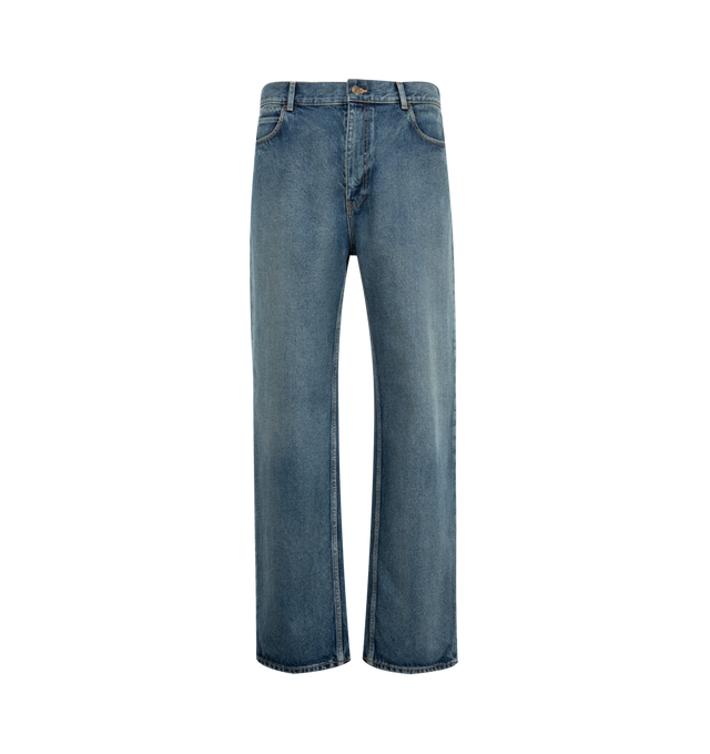 Image 1 of 3 - BLUE - The Row Men's Vanya Jeans are crafted from cotton denim and feature a mid-rise silhouette with a wide leg, contrast topstitching, and classic five-pocket construction. The denim undergoes a brushed treatment to create a naturally aged appearance, followed by a light indigo overdye that enhances tonal variation and adds richness to the color. Main Material: 100% Cotton. Fit: Mid-Rise, Wide Leg. Details: Contrast Topstitching and Five-Pocket Construction. Made in Japan. 