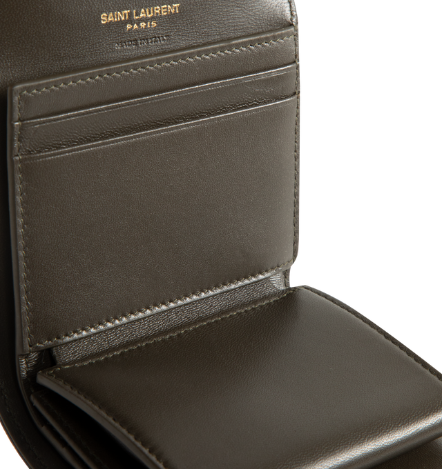 Image 3 of 3 - BROWN - SAINT LAURENT Multi Fold Wallet featuring chevron quilted overstitching, cassandre logo, leather lining, gold-toned hardware, snap-button closure, five card slots, one coin pocket, one bill compartment and one receipt compartment. 4.1 x 3.5 x 1.2 inches. Lambskin. Made in Italy.  