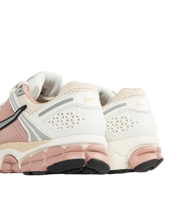Image 3 of 5 - PINK - NIKE Zoom Vomero 5 SE Sneaker featuring upper that mixes synthetic leather for a layered look, ventilation ports on the heel, Zoom Air cushioning, plastic caging on the side, rubber outsole, metallic accents, foam midsole and rubber outsole. 