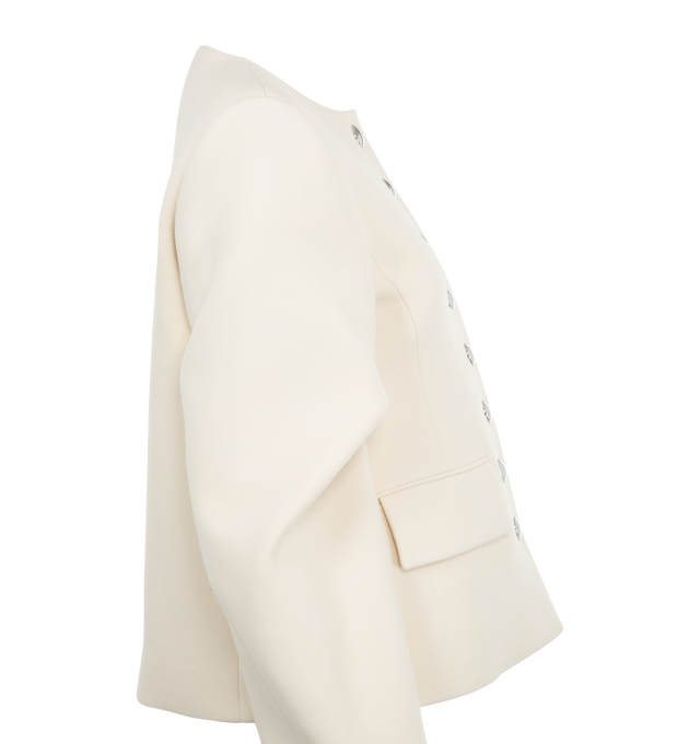 Image 3 of 3 - WHITE - Khaite classic jacket reimagined. Clean lines at the neckline and shoulders are softened by curved seaming and sculpted sleeves. Chrome snap buttons. Structured wool suiting (53% polyester, 43% wool, 4% elastane). 