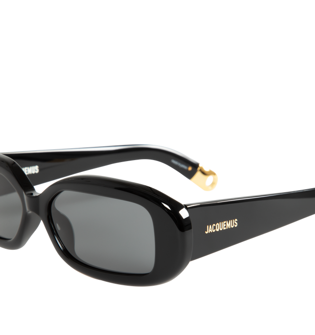 Image 3 of 3 - BLACK - Jacquemus X Linda Farrow Rond Sunglasses are crafted with an acetate frame with acetate temples, gray lenses, and gold temple details. 100% UV-protected solid lenses. Made in Italy.  