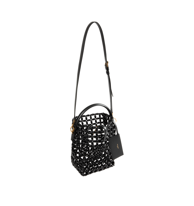Image 2 of 3 - BLACK - Saint Laurent Womens Le 37 Bucket Bag is crafted from wooden beads. Features an open-work design, top handle, adjustable and removable crossbody strap, YSL strap closure, interior zip pouch, and bronze-tone hardware. Dimensions: 17  20  13 cm. Main Material: Wooden Beads; Hardware: Bronze-Tone Metal. Made in Italy. 