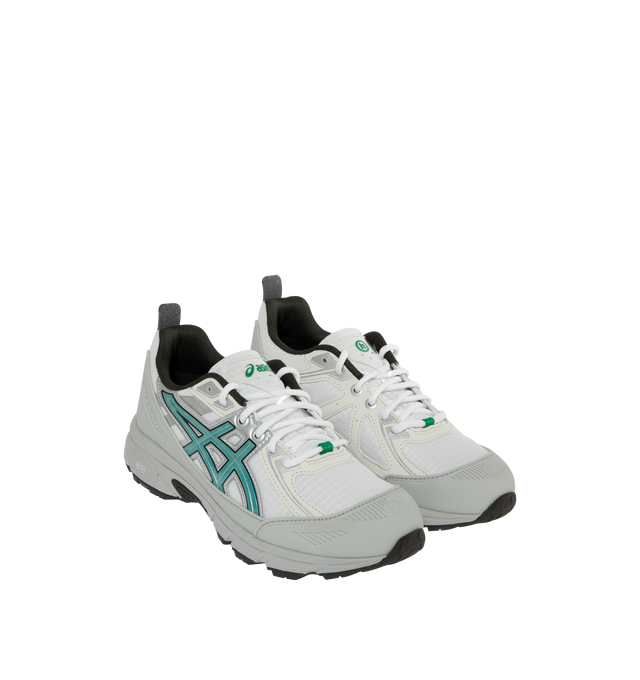 Image 2 of 5 - WHITE - Asics Hidden Nygel-Venture 6 Shield Sneakers are a lace-up style with rip stop mesh, reflective accents, clear laces, rearfoot GEL technology, and a trail-specific traction pattern.  