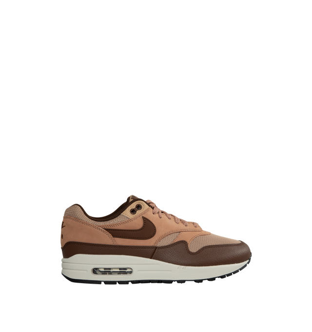 Image 1 of 5 - BROWN - NIKE AIR MAX 1 SC Cacao Wow and Dusted Clay in a rich "Cacao Wow" burgundy-tone mudguard with "Dusted Clay" leather overlays and hemp-hued mesh in the upper.  Featuring leather and mesh upper, air cushioning and rubber outsole, visible Max Air unit in the heel and Nike Air cushioning in the forefoot. The plush foam midsole and padded, low-cut collar add comfort. 