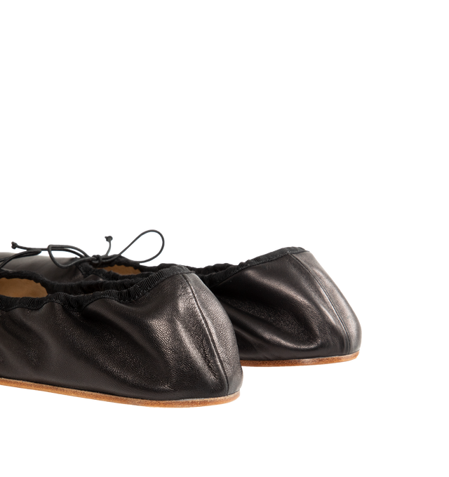 Image 3 of 4 - BLACK - The Row Classic ballet flat in smooth nappa leather with grosgrain piping, adjustable elastic tie, and flexible leather sole. 100% Lambskin Leather with leather sole. Made in Italy. 