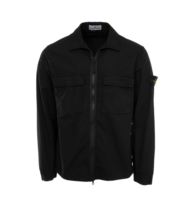 BLACK - STONE ISLAND Zip-Up Overshirt featuring regular fit, two patch breast pockets with flap, Stone Island badge on the left sleeve, adjustable snap at cuffs and two-way zipper closure. 98% cotton, 2% elastane/spandex.