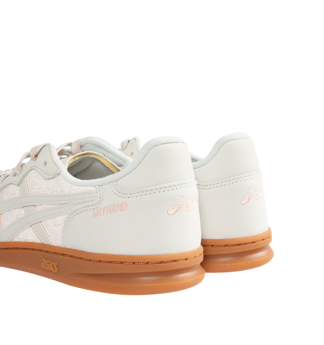 Image 3 of 5 - WHITE - ASICS Skyhand OG Sneaker featuring soft suede upper, FLYTEFOAM PROPEL cushioning, EVA heel wedge, pearl-like shoelace accessory, patterned shoelace and rubber outsole. 