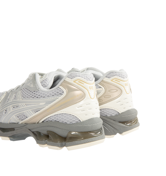 Image 3 of 5 - WHITE - Asics GEL-Kayano 14 Sneakers are lace-up style with rip-stop underlays, GEL cushioning, and TRUSSTIC support system. Unisex style in men's sizing. 