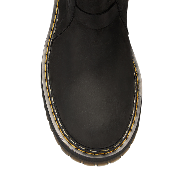 Image 7 of 7 - BLACK - Dr. Martens x Rick Owens FW26 Quad Sole Pull On Boot in Nubuck Leather. These Men's Dr. Martens boots are reimagined by Rick Owens and are mid-calf height with a steel toe cap and palladium-finish hardware, including snaps and a side zipper. They feature a topstitched seam arcing over the front foot, a stitched heel counter, two side pull tabs, and a woven Dr. Martens AirWair heel loop in black and pearl. The boots are finished with a Quad sole and a yellow and pearl welt stitch. This 