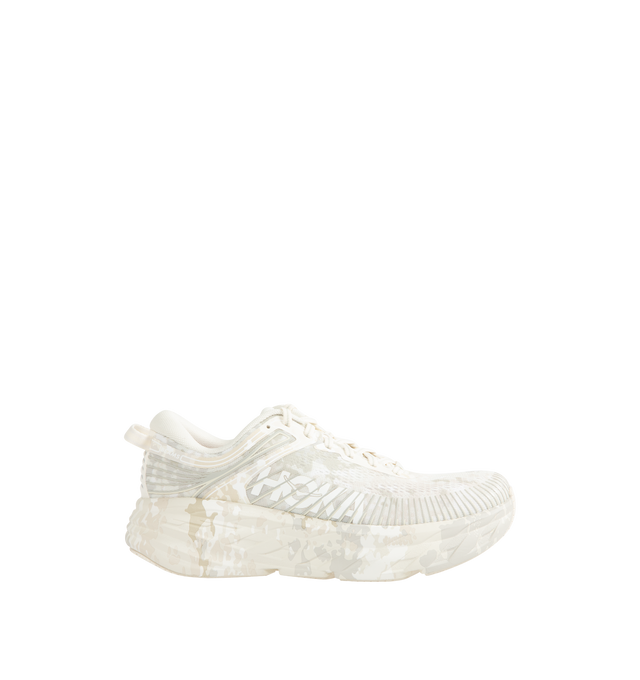 Image 1 of 5 - WHITE - Hoka Unisex Bondi 7 Beams Sneakers reinterpret the ultra-cushioned silhouette with a custom camouflage upper inspired by Japanese Zen gardens. The vegan open-mesh construction features a memory foam collar, TPU overlays, 3D-printed logos, a reflective secondary lace, and a lace keeper. Upper: Vegan Mesh and TPU. *Unisex style in men's sizing. 