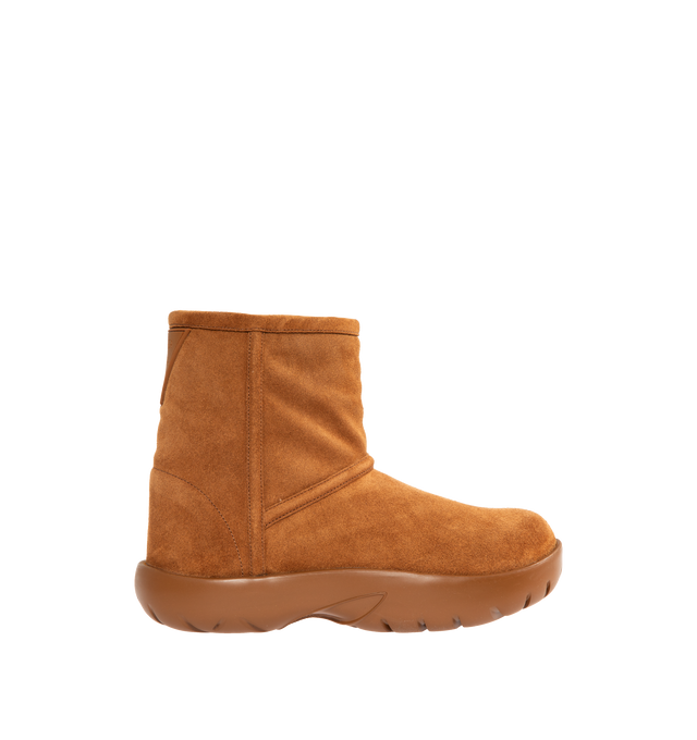 BROWN - BOTTEGA VENETA Snap Suede Ankle Boot featuring suede finish, round toe, exaggerated track sole, ultra lightweight rubber outsole Shearling lined.