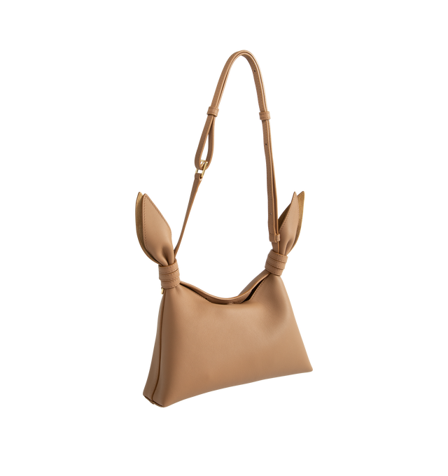 Image 2 of 3 - BROWN - Loewe Women's Mini Scarf Bag is crafted from suede and features the collection's signature silhouette formed by two panels elegantly tied together with a leather knot, finished with a distorted Pebble detail. Designed for hand, shoulder, or crossbody carry, this compact style is equipped with an adjustable leather strap, magnetic closure, nappa lining, engraved Anagram Pebble hardware, and embossed 'LOEWE' branding. Main Material: Suede. Lining: Nappa Leather. Dimensions: 24.5 x 14.5  