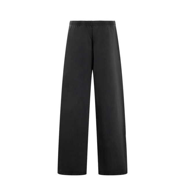 Image 2 of 3 - BLACK - Balenciaga Men's Balenciaga Back Oversized Baggy Sweatpants are crafted from faded black dry cotton fleece and feature a mid-rise, oversized silhouette. An elasticated drawstring waistband, two slash pockets, and Balenciaga logo embroidered at the front complete the design. Main Material: 100% Cotton. Pocket Lining: 100% Cotton. Embroidery: 100% Polyester. Made in Portugal. 