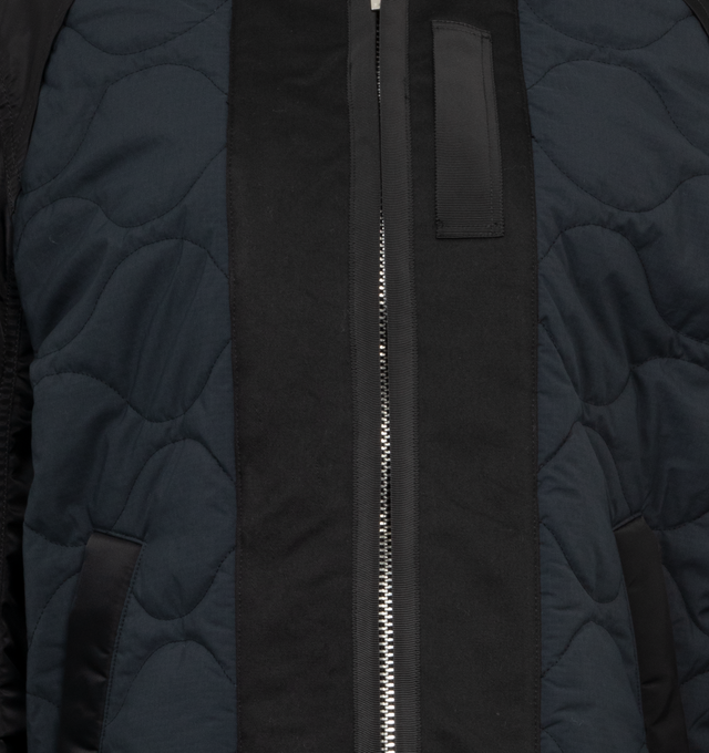 Image 4 of 4 - BLACK - SACAI Nylon Twill X Ripstop Jacket featuring two way zip front closure, zip sides, quilted front and back, slit pockets with snap button closure on front, zip pocket on sleeve and stand collar.  