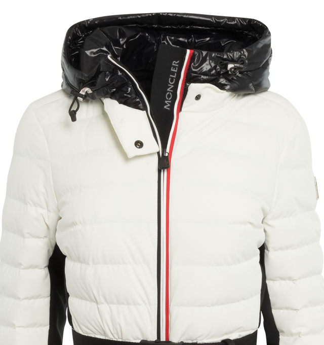 Image 3 of 3 - WHITE - MONCLER GRENOBLE BRUCHE JACKET featuring stretch nylon lining, down-filled, hood with drawstring fastening in contrasting color and nylon laqu hood lining, tri-colored zipper edgings, YKK AquaGuard Highly Water Resistant zipper closure, detachable and adjustable belt with a side-release buckle, exterior pockets with YKK AquaGuard Highly Water Resistant zipper closure, interior media pocket, interior powder skirt, stretch jersey wrist gaiters and ski pass pocket. 84% polyamide/nylon, 1 