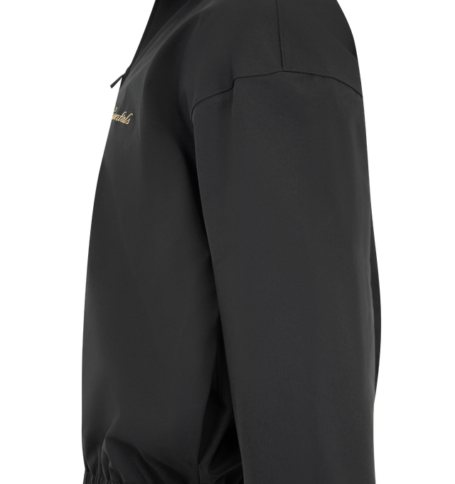 Image 3 of 3 - BLACK - FEAR OF GOD ESSENTIALS Signature Full Zip Track Jacket featuring stretch nylon taffeta, rib-knit stand collar, zip closure, logo embroidered at chest, seam pockets at waist, elasticized hem and cuffs, rubberized logo patch at back collar and full mesh lining. 90% nylon, 10% spandex. 