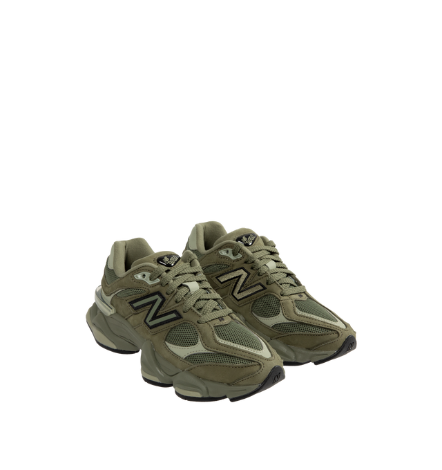 Image 2 of 5 - GREEN - New Balance 9060 Sneakers are a lace-up style with pigskin and mesh details, dual-density midsoles with ABZORB and SBS cushioning, translucent CR devices at the heels, and diamond pattern outsoles.  