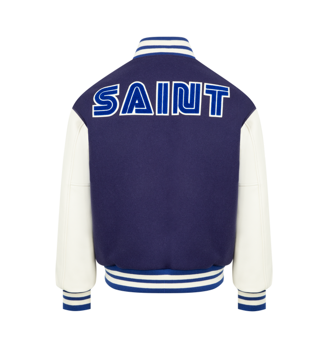 Image 2 of 3 - BLUE - SAINT MICHAEL SG Saint SEGA Varsity Jacket featuring appliqu striped ribbed trim, press-stud fastening, side welt pockets and long sleeves. 90% wool, 10% nylon. 