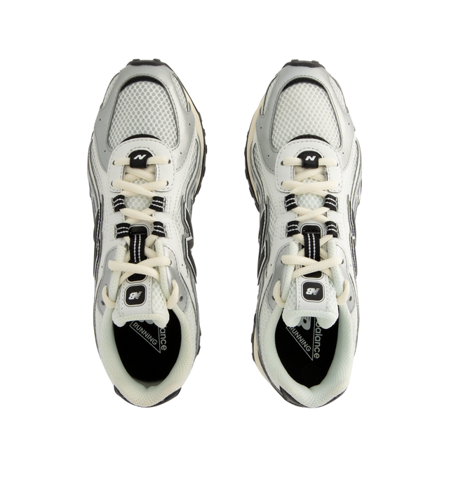 Image 5 of 5 - GREY - New Balance Mens 204L Sneakers feature a low-profile silhouette with a synthetic upper, embossed overlays, screen-printed saddle graphics, and double-stacked suede "N" logo. Designed with an EVA outsole and a distinctive tread pattern inspired by 2000s running shoes and 1970s heritage styles. Upper: Synthetic with Suede Details; Outsole: EVA. Made in Indonesia. 