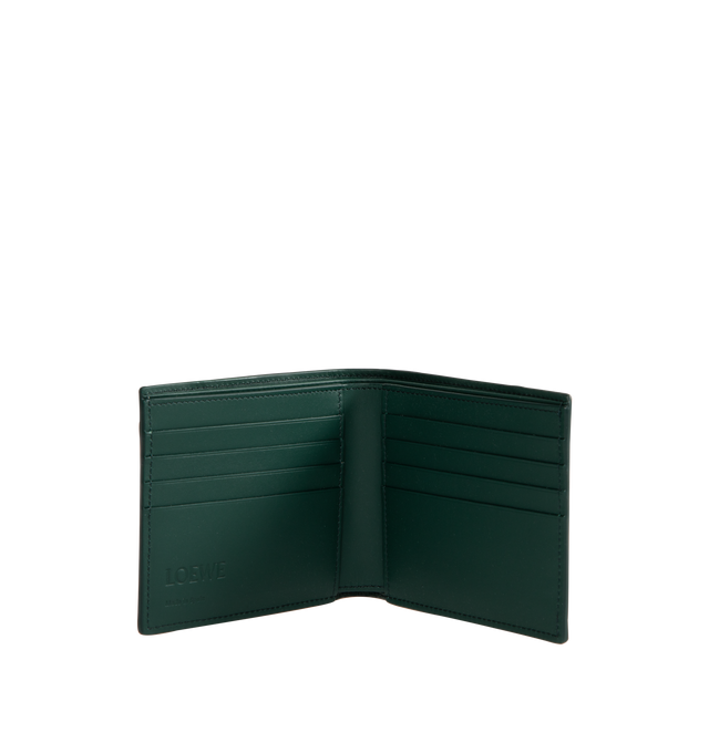 Image 3 of 3 - GREEN - Loewe Men's Puzzle bifold wallet in classic calfskin leather inspired by the Puzzle bag's distinctive geometric pattern. Features eight card slots, two large note pockets, two flat pockets, calfskin lining and embossed Anagram. Made in Spain. Height 9.9cm X Width 11cm X Depth 1.8cm. 