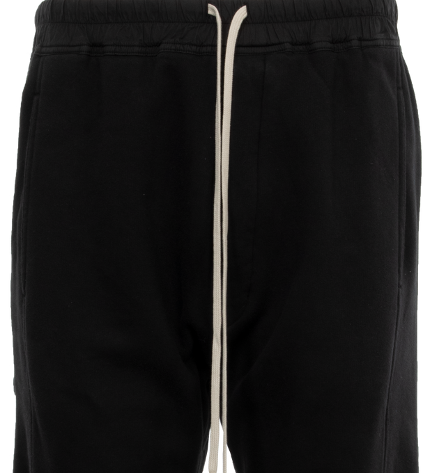 Image 4 of 4 - BLACK - DRKSHDW Pusher Pants featuring drawstring waist, side pockets, snap button and cargo pockets. 100% cotton. 