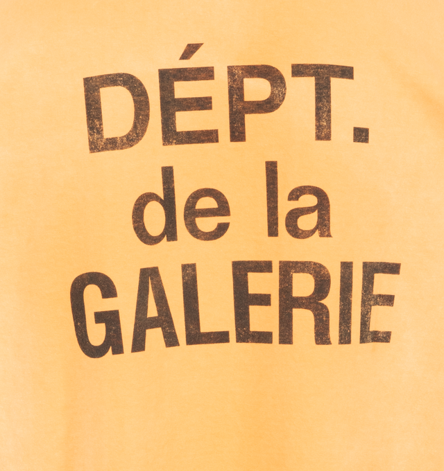 Image 4 of 4 - ORANGE - Gallery Dept. classic long sleeve tee in a boxy and relaxed fit with signature French logo and a vintage, worn look. Made in Los Angeles, CA. Material: 100% Cotton.  