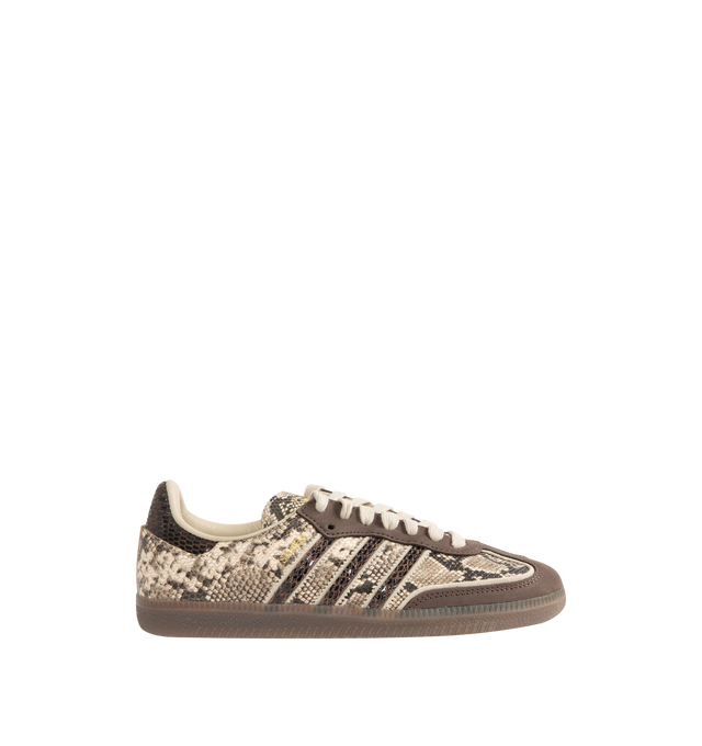 Image 1 of 5 - BROWN - Adidas Mens Snake-Effect Sneakers are crafted from calf leather. Features a snake-effect finish, round toe, lace-up closure, signature 3-Stripes, logo-print tongue, branded heel counter, and flat rubber sole. Upper: Calf Leather; Lining: Calf Leather; Sole: Rubber. Made in Vietnam. 