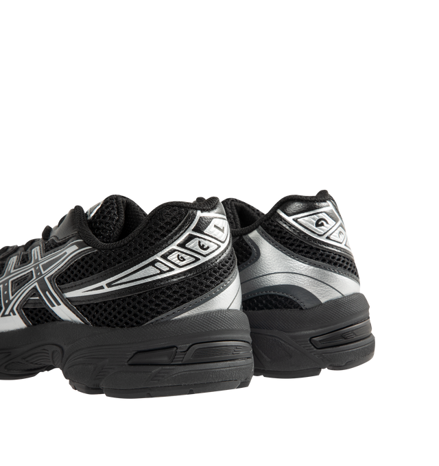 Image 3 of 5 - BLACK - Asics GEL-Kayano 14 Sneakers are lace-up style with rip-stop underlays, GEL cushioning, and TRUSSTIC support system. Unisex style in men's sizing. Imported from Indonesia. 