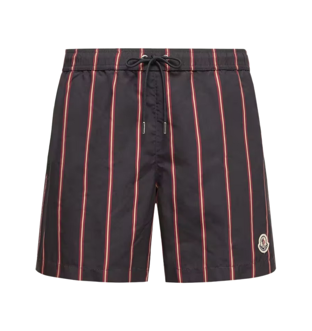 Image 1 of 1 - MULTI - Moncler Mens Printed Swim Shorts are crafted from polyester with a soft, sueded feel. Features a regular fit, micro mesh lining, elastic waistband with drawstring fastening, side pockets, back snap-button pocket, and logo patch. Main Material: 100% Polyester; Lining: 100% Polyamide/Nylon. Made in Moldova. 