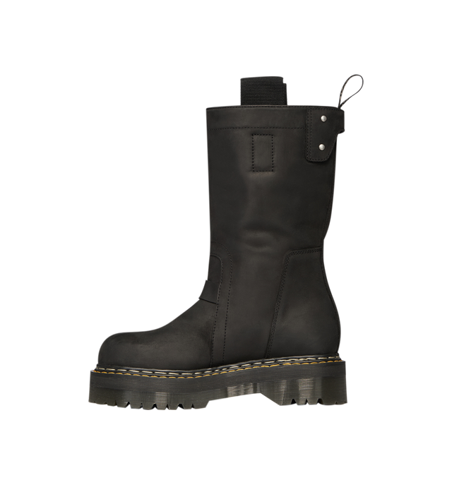 Image 5 of 7 - BLACK - Dr. Martens x Rick Owens FW26 Quad Sole Pull On Boot in Nubuck Leather. These Men's Dr. Martens boots are reimagined by Rick Owens and are mid-calf height with a steel toe cap and palladium-finish hardware, including snaps and a side zipper. They feature a topstitched seam arcing over the front foot, a stitched heel counter, two side pull tabs, and a woven Dr. Martens AirWair heel loop in black and pearl. The boots are finished with a Quad sole and a yellow and pearl welt stitch. This 