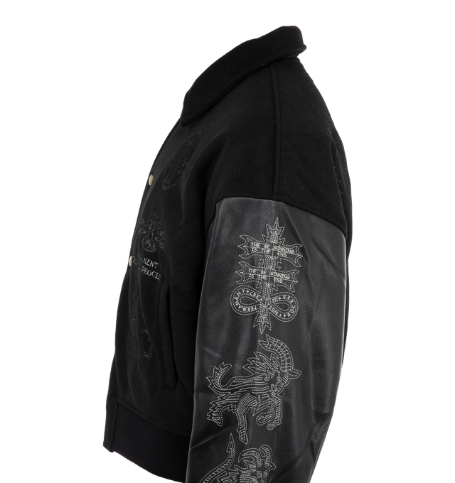 Image 3 of 3 - BLACK - UNTITLED ARTWORKS Angel Of Death Varsity Jacket featuring front press-stud fastening, embroidered motif, spread collar, drop shoulder, long leather sleeves, two side welt pockets, diamond quilting and ribbed cuffs and hem. 100% leather. 100% wool. 