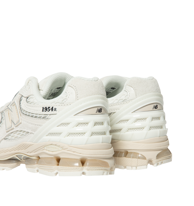 Image 3 of 5 - WHITE - New Balance 1954R Unisex Sneakers feature a suede and mesh upper inspired by the 2002 and 1906 models, combining breathable mesh with synthetic and pig suede overlays. ABZORB midsole cushioning absorbs impact through a combination of cushioning and compression resistance, while a traditional lace-up closure provides an adjustable fit. Upper: Synthetic, Mesh, and Pig Suede.  