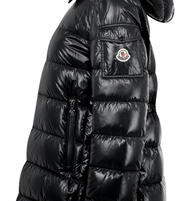 Image 3 of 3 - BLACK - MONCLER Courcelles Hooded Mid-Length Down Jacket featuring nylon laqu lining, down-filled, hood, zipper closure, zipped pockets, sleeve pocket with snap button closure, waist and hem with drawstring-fastening and adjustable cuffs. 100% polyamide/nylon. Padding: 90% down, 10% feather. 