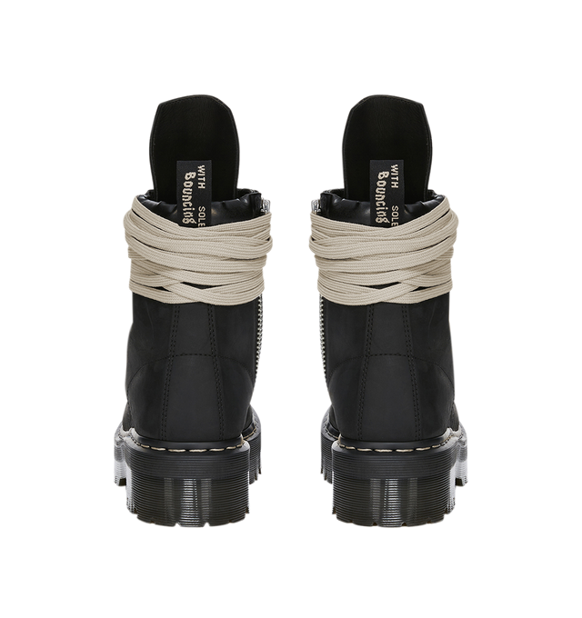 Image 6 of 7 - BLACK - Dr. Martens x Rick Owens FW26 Quad Sole Steel Toe Boot in Nubuck Leather. These Women's Dr. Martens boots are reimagined by Rick Owens and feature pearl lacing, a steel toe cap, and palladium-finish hardware, including eyelets, hooks, and a side zipper. The boot features an extended geometric tongue and a woven Dr. Martens AirWair heel loop in black and pearl. Finished with a Quad sole, the design is detailed with a pearl welt stitch. This heavyweight nubuck cow leather has a flat, ma 
