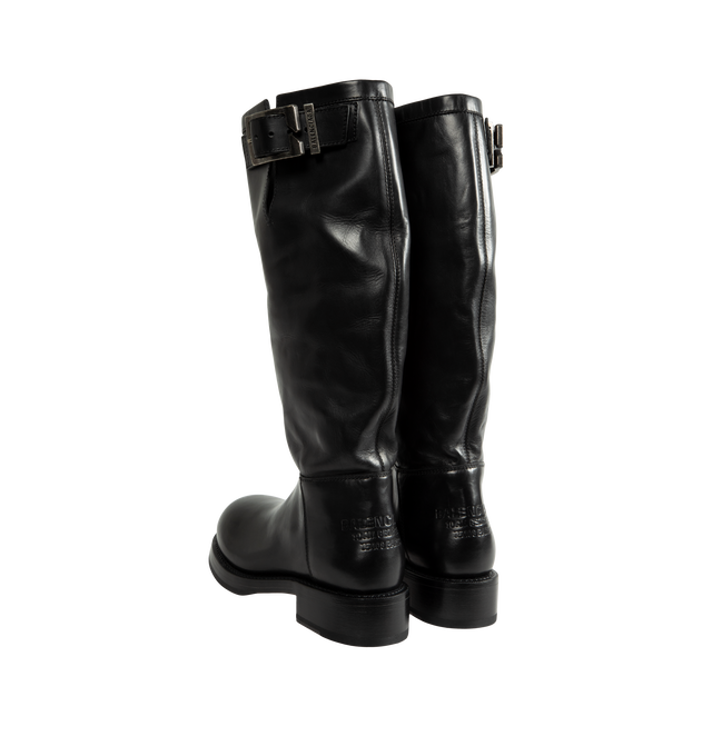 Image 3 of 4 - BLACK - Balenciaga Women's Motor Boot is crafted from calfskin leather and features a round-toe silhouette, a worn-in finish, and a sturdy Goodyear welt construction. Designed with a supple upper for versatile styling, this elevated boot is finished with an adjustable strap, a Balenciaga-engraved belt buckle, and debossed Balenciaga branding at the heel counter. Main Material: Calfskin Leather. Sole: Calfskin Rubber. Insole: Calfskin. Made in Italy. 