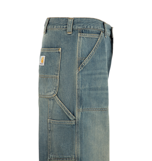 Image 3 of 3 - BLUE - Carhartt WIP Men's Oakland Pant is crafted from heavyweight 12 oz Camano cotton denim and features a loose straight fit with a regular waist. Inspired by classic workwear silhouettes, it is designed with double-layer knees, tool pockets, a hammer loop, triple-stitched construction, bartack reinforcement at key stress points, a woven Square Label at the back pocket, and a zip fly closure. Main Material: 100% Cotton Camano Denim.  