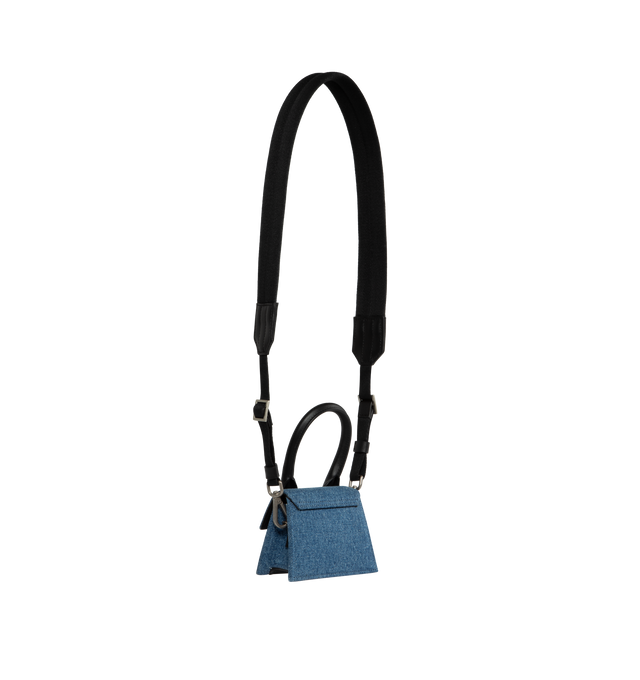Image 2 of 3 - BLUE - JACQUEMUS Le Chiquito Homme Bag featuring denim and calf leather, logo lettering, foldover top with magnetic fastening, adjustable detachable shoulder strap, single rolled top handle, main compartment, internal logo patch and silver-tone hardware. 2.36 x 3.54 x 4.72 inches. 100% fabric. 100% calf leather.  
